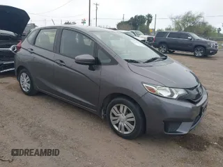 2017 Honda Fit LX with VIN JHMGK5H54HS019316, listed as a IAAI auction lot 41709220 with 96,058 mi miles. Bid and sale history available at carsss.com. Image 1.