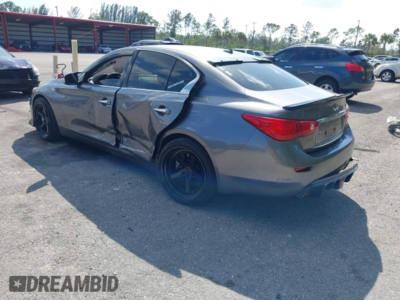 2014 Infiniti Q50 Sport with VIN JN1BV7AP4EM670443, listed as a IAAI auction lot 41801219 with 98,719 mi miles and . Bid and sale history available at DreamBid. Image 3.