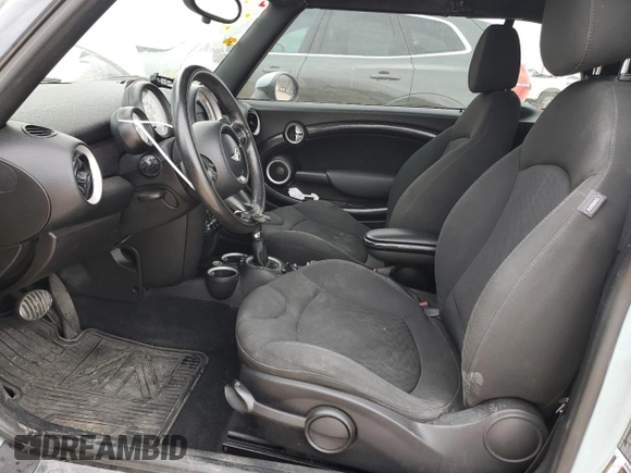 2014 MINI Convertible S with VIN WMWZP3C56ET707425, listed as a Copart auction lot 50894965 with 100,116 mi miles and Salvage Title. Bid and sale history available at DreamBid. Image 7.