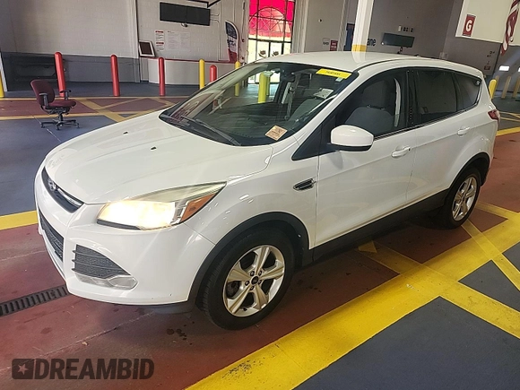 2014 Ford Escape SE z VIN 1FMCU9GX7EUC02600, wystawiony jako IAAI lot #42570755 z przebiegiem 86 871 mil mil oraz . Historia ofert i sprzedaży dostępna na DreamBid. Obrazek 24.