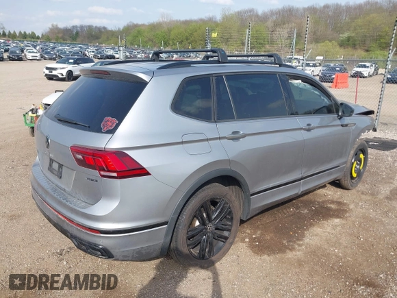 2022 Volkswagen Tiguan SE R-Line Black with VIN 3VV8B7AX7NM030703, listed as a IAAI auction lot 42135974 with 57,116 mi miles and . Bid and sale history available at DreamBid. Image 4.