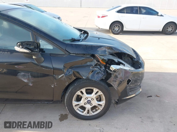 2014 Ford Fiesta SE with VIN 3FADP4BJ0EM139467, listed as a IAAI auction lot 41817437 with 45,570 mi miles and . Bid and sale history available at DreamBid. Image 6.