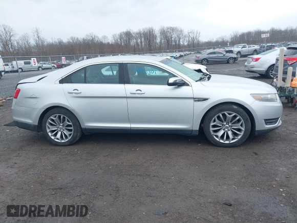 2014 Ford Taurus Limited with VIN 1FAHP2F81EG123933, listed as a IAAI auction lot 41843301 with 111,629 mi miles. Bid and sale history available at carsss.com. Image 13.