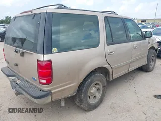 1997 Ford Expedition XLT with VIN 1FMEU1765VLB24163, listed as a IAAI auction lot 42303093 with 137,427 mi miles and . Bid and sale history available at DreamBid. Image 4.