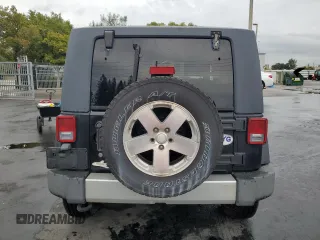 2009 Jeep Wrangler Sahara with VIN 1J4FA54109L702963, listed as a Copart auction lot 89211555 with 125,138 mi miles and Clean title. Bid and sale history available at DreamBid. Image 6.