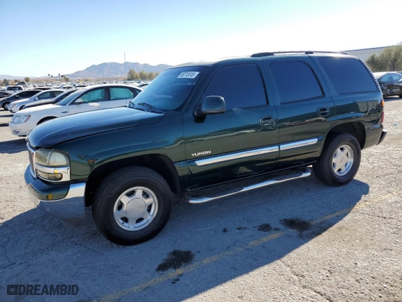 2004 GMC Yukon SLT with VIN 1GKEC13T94R173580, listed as a Copart auction lot 88712415 with 174,011 mi miles and Salvage Title. Bid and sale history available at carsss.com. Image 1.