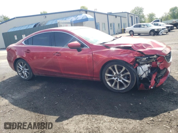 2014 Mazda 6 i Grand Touring with VIN JM1GJ1W57E1104393, listed as a Copart auction lot 55399775 with 187,868 mi miles and Clean Title. Bid and sale history available at DreamBid. Image 4.