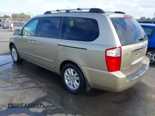 2007 Kia Sedona LX with VIN KNDMB233676171551, listed as a IAAI auction lot 40801032 with 142,581 mi miles. Bid and sale history available at carsss.com. Image 3.