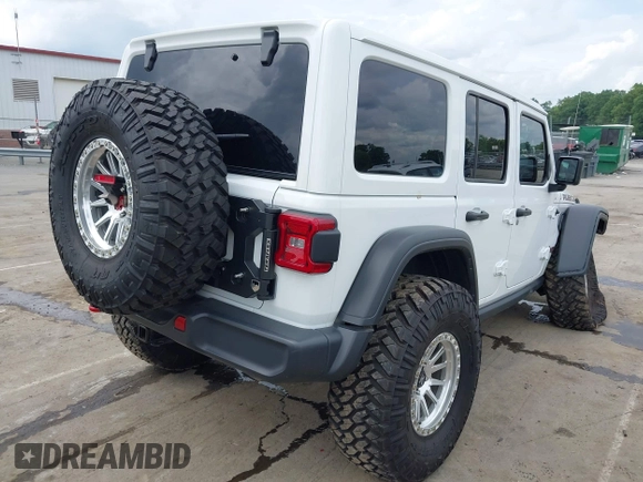 2021 Jeep Wrangler Unlimited Rubicon with VIN 1C4HJXFG7MW527498, listed as a IAAI auction lot 42393520 with 18,085 mi miles and . Bid and sale history available at DreamBid. Image 4.