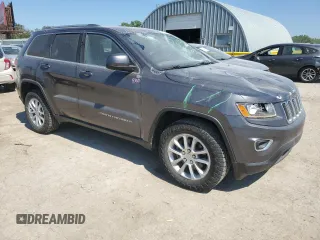 2016 Jeep Grand Cherokee Laredo with VIN 1C4RJFAG2GC328841, listed as a Copart auction lot 63553435 with 100,472 mi miles and Salvage title. Bid and sale history available at DreamBid. Image 4.