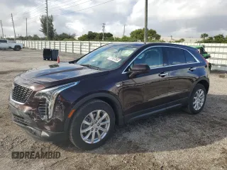 2021 Cadillac XT4 FWD Luxury z VIN 1GYAZAR44MF074248, wystawiony jako Copart lot #77187354 z przebiegiem 32 601 mil mil oraz Szkoda całkowita • Salvage title. Historia ofert i sprzedaży dostępna na DreamBid. Obrazek 1.
