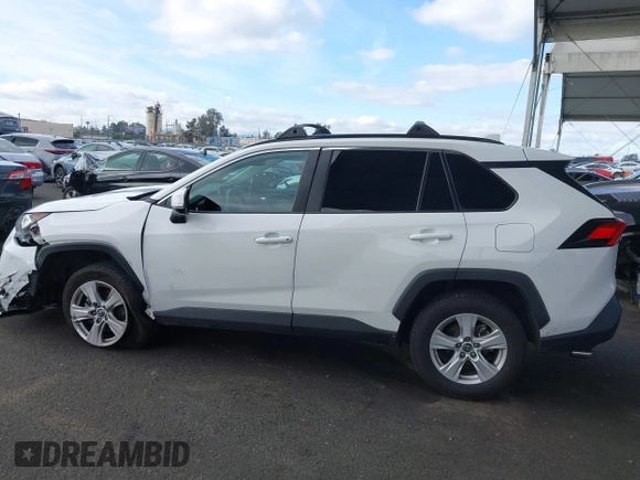 2019 Toyota RAV4 XLE with VIN 2T3W1RFV5KW051023, listed as a IAAI auction lot 40970612 with 106,359 mi miles and . Bid and sale history available at DreamBid. Image 13.