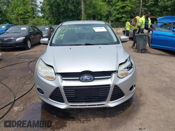 2013 Ford Focus SE with VIN 1FADP3F28DL208516, listed as a IAAI auction lot 42399006 with 103,869 mi miles and . Bid and sale history available at DreamBid. Image 12.