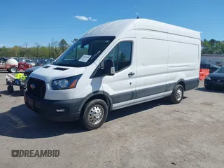 2022 Ford Transit Cargo with VIN 1FTBW3X80NKA69156, listed as a IAAI auction lot 42059236 with 100,096 mi miles and . Bid and sale history available at DreamBid. Image 2.