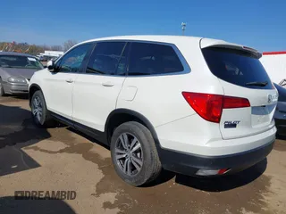 2016 Honda Pilot EX-L with VIN 5FNYF6H5XGB066295, listed as a IAAI auction lot 42063630 with 156,734 mi miles. Bid and sale history available at carsss.com. Image 3.