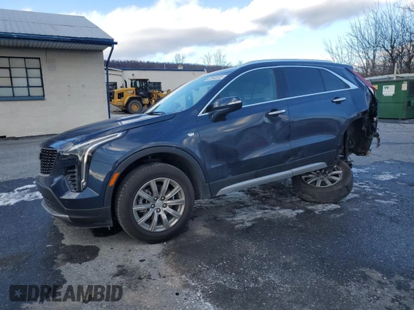 2021 Cadillac XT4 AWD Premium Luxury with VIN 1GYFZDR4XMF007080, listed as a Copart auction lot 87943335 with 36,379 mi miles and Salvage Title. Bid and sale history available at carsss.com. Image 1.
