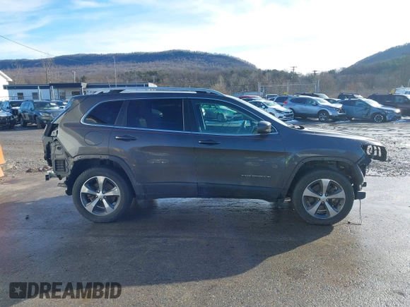 2019 Jeep Cherokee Limited z VIN 1C4PJMDX0KD125991, wystawiony jako IAAI lot #41101916 z przebiegiem 76 867 mil mil oraz . Historia ofert i sprzedaży dostępna na DreamBid. Obrazek 14.