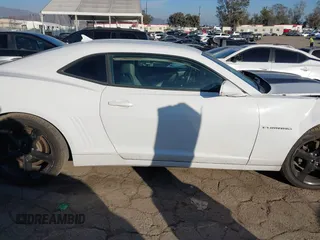 2014 Chevrolet Camaro LT z VIN 2G1FC1E39E9321549, wystawiony jako IAAI lot #41582840 z przebiegiem 129 495 mil mil oraz . Historia ofert i sprzedaży dostępna na DreamBid. Obrazek 14.