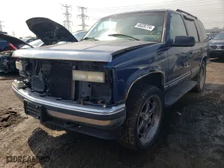1999 Chevrolet Tahoe Z71 with VIN 1GNEK13R2XJ523810, listed as a Copart auction lot 64247874 with 151,373 mi miles and Salvage Title. Bid and sale history available at carsss.com. Image 1.