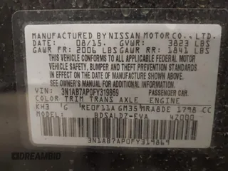 2015 Nissan Sentra S with VIN 3N1AB7AP0FY319869, listed as a IAAI auction lot 41844863 with 144,682 mi miles. Bid and sale history available at carsss.com. Image 9.