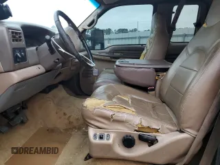 1999 Ford F-250 XL with VIN 1FTNX20FXXEA40858, listed as a Copart auction lot 63296925 with 368,565 mi miles and Salvage title. Bid and sale history available at DreamBid. Image 7.