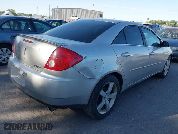 2006 Pontiac G6 GTP with VIN 1G2ZM551064133597, listed as a IAAI auction lot 42383557 with 240,918 mi miles and . Bid and sale history available at DreamBid. Image 4.