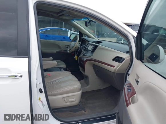 2014 Toyota Sienna XLE z VIN 5TDYK3DC5ES439511, wystawiony jako IAAI lot #41510779 z przebiegiem 218 782 mil mil oraz . Historia ofert i sprzedaży dostępna na DreamBid. Obrazek 5.