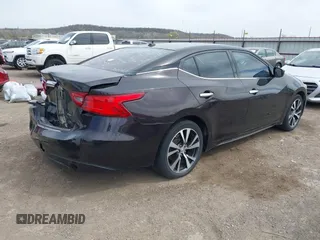 2016 Nissan Maxima SL with VIN 1N4AA6AP3GC393930, listed as a IAAI auction lot 41829151 with 202,255 mi miles and . Bid and sale history available at DreamBid. Image 4.