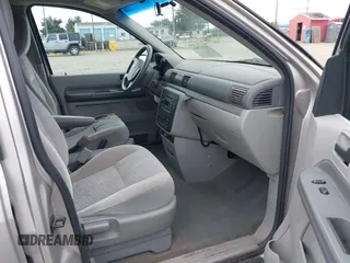 2004 Ford Freestar SE z VIN 2FMZA51664BA73569, wystawiony jako IAAI lot #39712844 z przebiegiem 182 013 mil mil oraz . Historia ofert i sprzedaży dostępna na DreamBid. Obrazek 5.