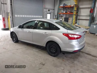 2012 Ford Focus SE with VIN 1FAHP3F26CL207199, listed as a IAAI auction lot 42149458 with 242,158 mi miles. Bid and sale history available at carsss.com. Image 3.