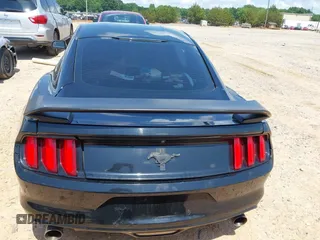 2017 Ford Mustang V6 z VIN 1FA6P8AM6H5342594, wystawiony jako IAAI lot #42479187 z przebiegiem 103 861 mil mil oraz . Historia ofert i sprzedaży dostępna na DreamBid. Obrazek 16.