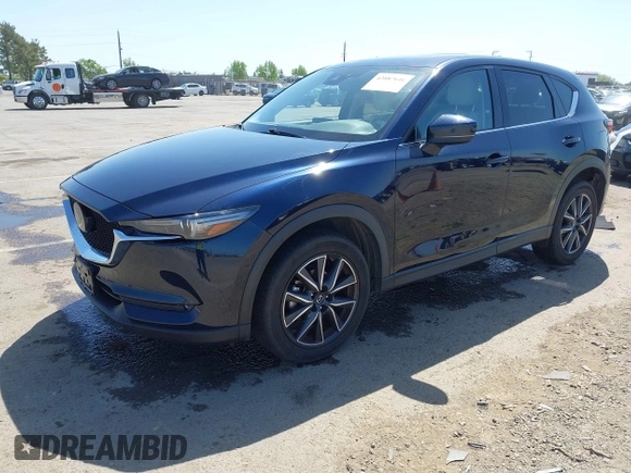 2018 Mazda CX-5 Grand Touring с VIN JM3KFBDM6J0326684, выставлен на аукционе IAAI как лот 42087646 с пробегом 111 192 миль миль и . История ставок и продаж доступна на DreamBid. Изображение 17.