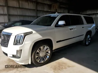 2015 Cadillac Escalade ESV Platinum z VIN 1GYS4UKJ2FR585169, wystawiony jako Copart lot #57628565 z przebiegiem 225 329 mil mil oraz Czysty tytuł • Clean title. Historia ofert i sprzedaży dostępna na DreamBid. Obrazek 1.