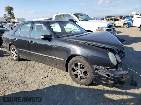 2002 Mercedes-Benz E-Class with VIN WDBJF65J72B424966, listed as a Copart auction lot 89323505 with 199,185 mi miles and Salvage Title. Bid and sale history available at carsss.com. Image 4.