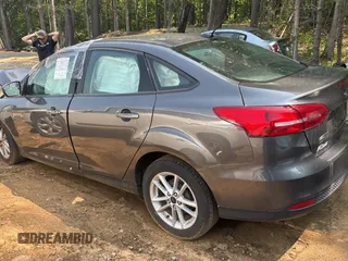 2017 Ford Focus SE with VIN 1FADP3F23HL200927, listed as a Copart auction lot 60996055 with Not provided miles and Clean title. Bid and sale history available at DreamBid. Image 3.