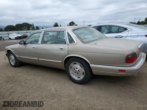 1997 Jaguar XJ Vanden Plas with VIN SAJKX6245VC800386, listed as a Copart auction lot 53651675 with 158,185 mi miles and Salvage Title. Bid and sale history available at DreamBid. Image 2.