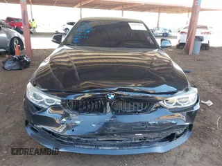 2015 BMW 4 Series 428i with VIN WBA3N3C55FK232613, listed as a IAAI auction lot 41865898 with 104,585 mi miles and . Bid and sale history available at carsss.com. Image 12.