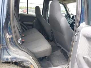 2002 Jeep Liberty Sport with VIN 1J4GL48K42W260513, listed as a IAAI auction lot 42163192 with 146,789 mi miles. Bid and sale history available at carsss.com. Image 8.