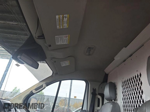 2016 Ford Transit Cargo z VIN 1FTYE1YM9GKB18600, wystawiony jako IAAI lot #42726792 z przebiegiem 127 434 mil mil oraz . Historia ofert i sprzedaży dostępna na DreamBid. Obrazek 2.
