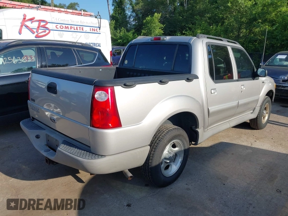 2003 Ford Explorer Sport Trac XLS z VIN 1FMZU67EX3UB19974, wystawiony jako IAAI lot #42563671 z przebiegiem 133 452 mil mil oraz . Historia ofert i sprzedaży dostępna na DreamBid. Obrazek 4.
