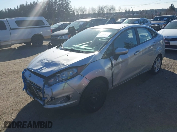 2017 Ford Fiesta SE z VIN 3FADP4BJXHM143658, wystawiony jako IAAI lot #41693045 z przebiegiem 142 361 mil mil oraz . Historia ofert i sprzedaży dostępna na DreamBid. Obrazek 2.