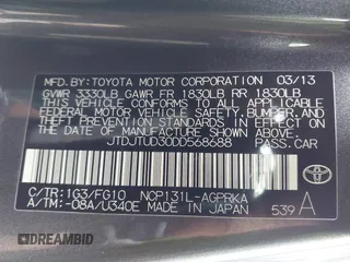 2013 Toyota Yaris L with VIN JTDJTUD30DD568688, listed as a IAAI auction lot 41665697 with 174,007 mi miles. Bid and sale history available at carsss.com. Image 9.