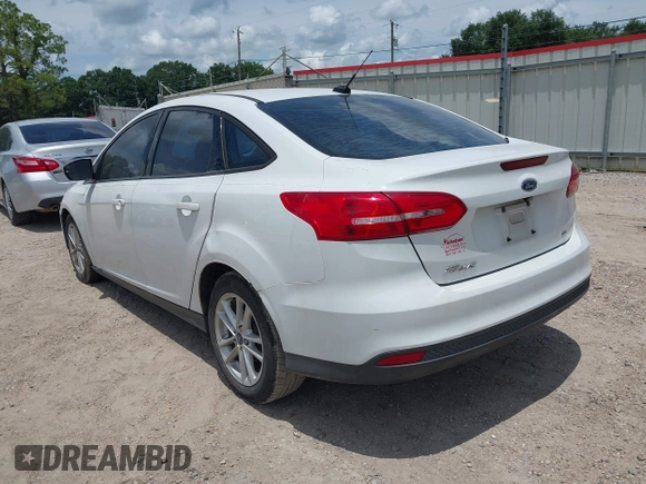2017 Ford Focus SE z VIN 1FADP3F24HL207613, wystawiony jako IAAI lot #42596200 z przebiegiem 151 347 mil mil oraz . Historia ofert i sprzedaży dostępna na DreamBid. Obrazek 3.