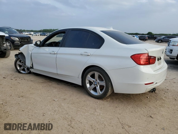 2014 BMW 3 Series 328i with VIN WBA3C1C52EK111563, listed as a Copart auction lot 51465165 with 142,125 mi miles and Salvage title. Bid and sale history available at DreamBid. Image 2.