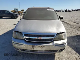 2002 Chevrolet Venture Warner Bros 1SE z VIN 1GNDX13E02D147755, wystawiony jako Copart lot #77258704 z przebiegiem 106 766 mil mil oraz Czysty tytuł • Clean title. Historia ofert i sprzedaży dostępna na DreamBid. Obrazek 5.