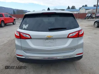 2018 Chevrolet Equinox LT z VIN 2GNAXSEV9J6212976, wystawiony jako IAAI lot #41643246 z przebiegiem 120 814 mil mil oraz . Historia ofert i sprzedaży dostępna na DreamBid. Obrazek 16.