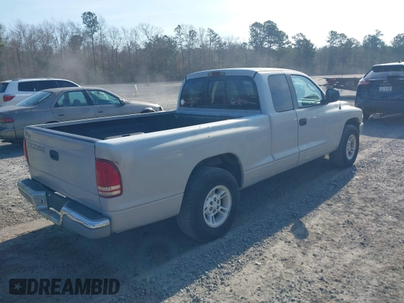 2000 Dodge Dakota with VIN 1B7GL22XXYS577744, listed as a IAAI auction lot 41509241 with 163,054 mi miles. Bid and sale history available at carsss.com. Image 4.