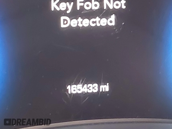 2015 Chrysler 300 Limited with VIN 2C3CCAAG5FH796498, listed as a IAAI auction lot 41520694 with 165,433 mi miles. Bid and sale history available at carsss.com. Image 7.