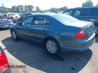2011 Ford Fusion Hybrid with VIN 3FADP0L3XBR217504, listed as a IAAI auction lot 42633083 with 166,274 mi miles and . Bid and sale history available at DreamBid. Image 3.