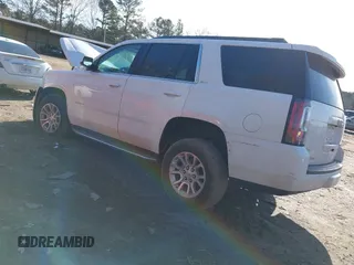 2019 GMC Yukon SLT with VIN 1GKS2BKC9KR166896, listed as a IAAI auction lot 41429865 with 165,174 mi miles. Bid and sale history available at carsss.com. Image 3.